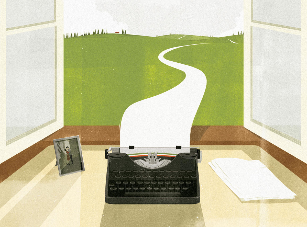 psací stroj před otevřeným oknem s výhledem do krajiny