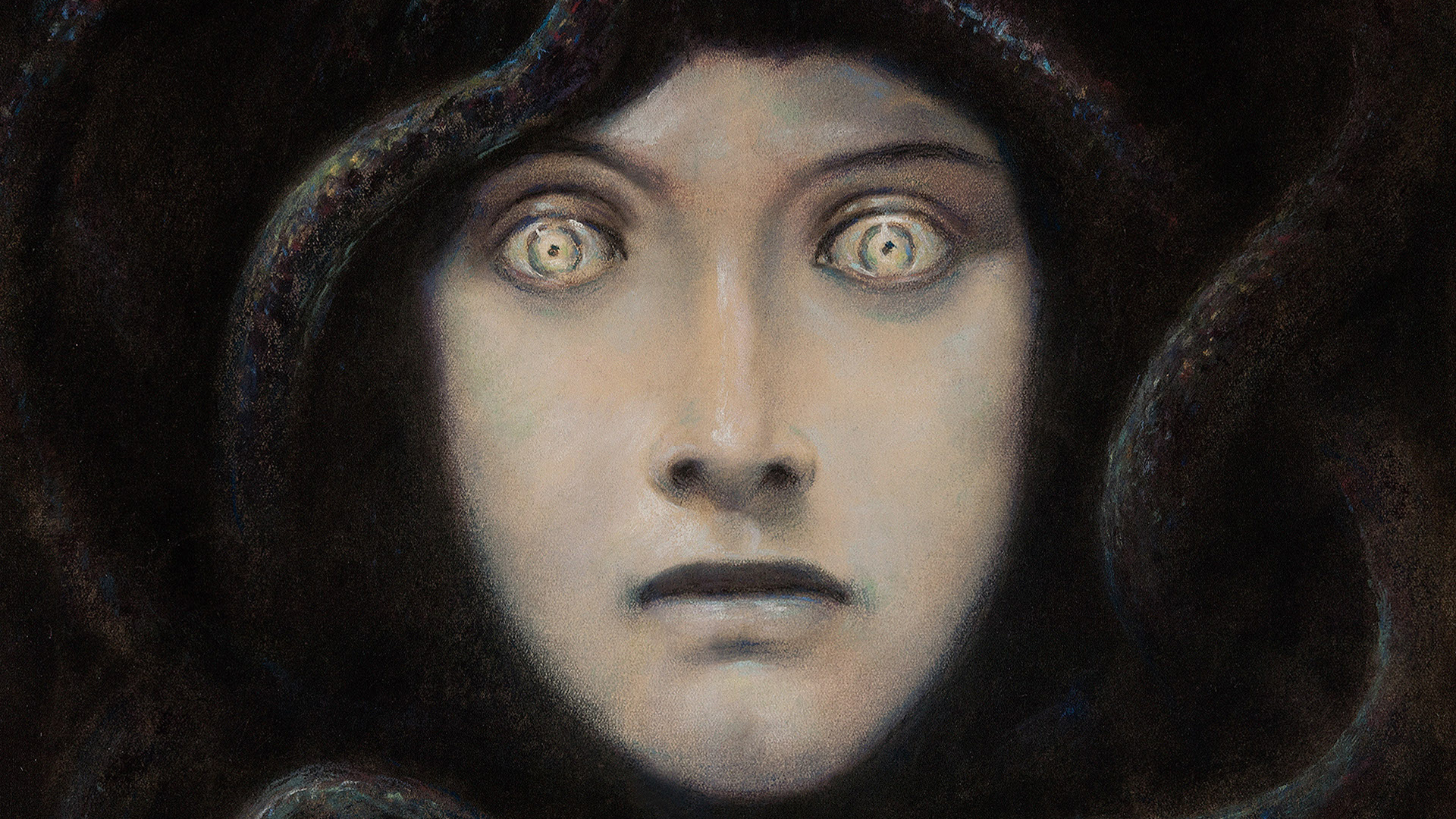 Výřez z pastelu Franze von Stucka Hlava medúzy